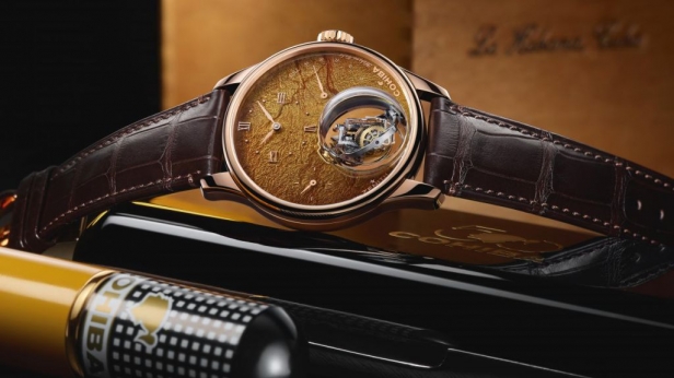 À l’occasion des cinquantenaire de Cohiba, Zenith a donné naissance à 5 pièces uniques au cadran en or gravé main avec un fond aux allures identiques à la feuille de tabac !